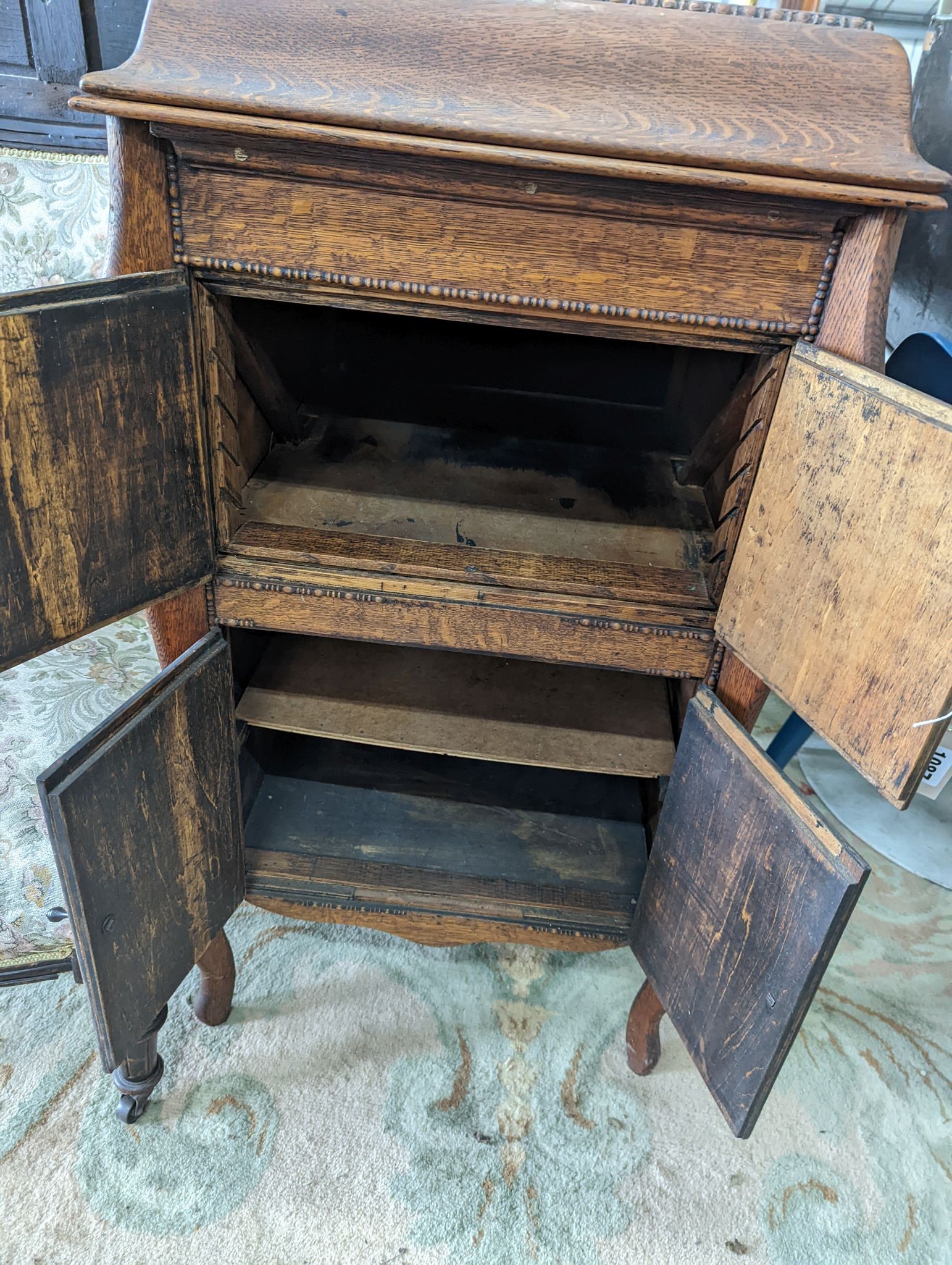 An early 20th century oak gramophone case (no record player), width 55cm, depth 60cm, height 102cm